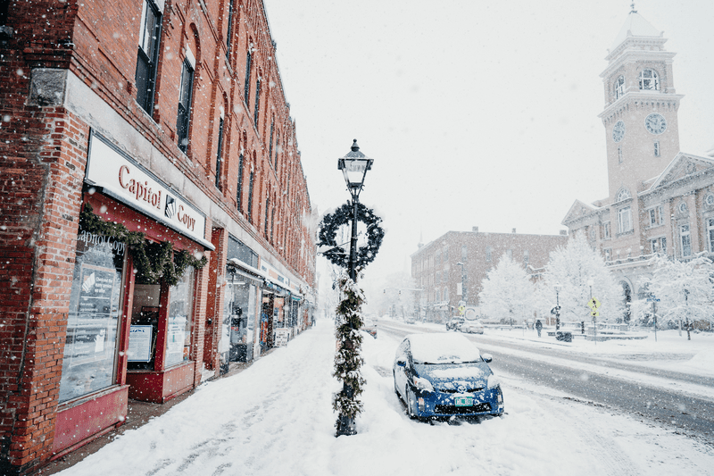 A historic downtown covered in snow.