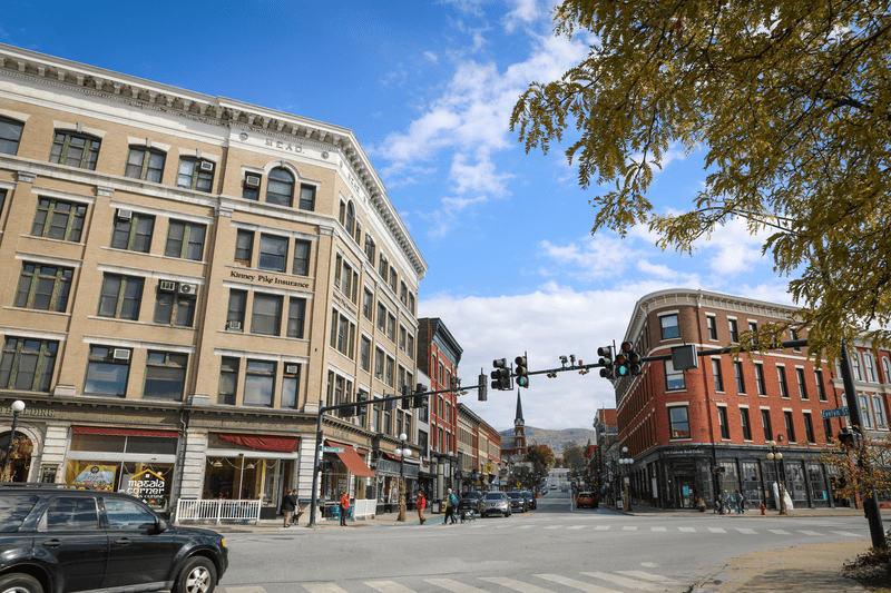 A downtown intersection lined with historic buildings.